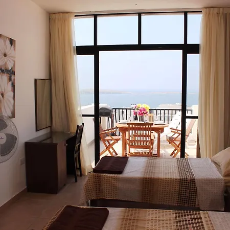 Seashells 2 Bedroom Apartment With Sunny Terrace With Stunning Panoramic Sea Views By Getaways Malta